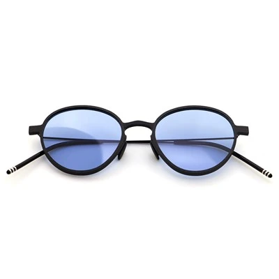 Gafas de sol redondas de fibra de carbono con patillas de metal